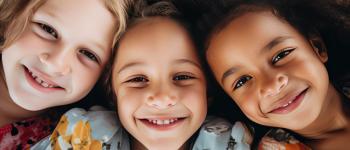 3 young girls smiling together